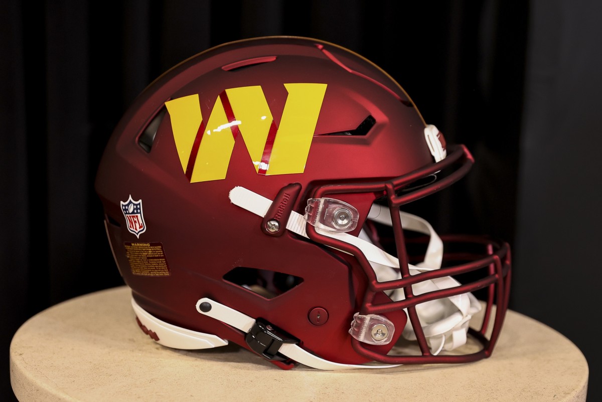 Mar 17, 2022; Ashburn, VA, USA; The helmet of Washington Commanders quarterback Carson Wentz sits on display for his introductory press conference at Inova Sports Performance Center Auditorium.