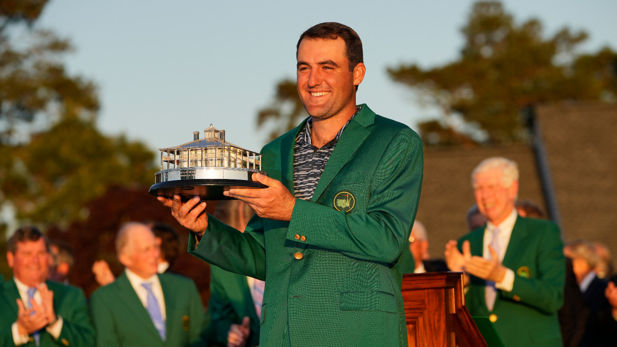 Apr 10, 2022; Augusta, Georgia, USA; 2022 Masters Champion Scottie Scheffler poses for photos with the Masters Trophy following the final round of the Masters Tournament at Augusta National Golf Club. Mandatory Credit: Adam Cairns-Augusta Chronicle/USA TODAY Sports