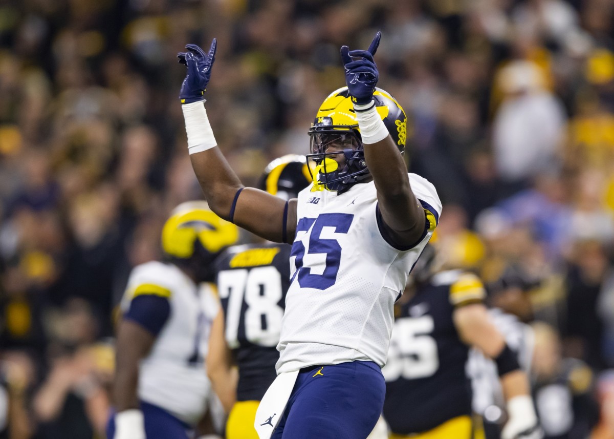 Dec 4, 2021; Indianapolis, IN, USA; Michigan Wolverines linebacker David Ojabo (55) celebrates a play against the Iowa Hawkeyes in the Big Ten Conference championship game at Lucas Oil Stadium. Mandatory Credit: Mark J. Rebilas-USA TODAY Sports
