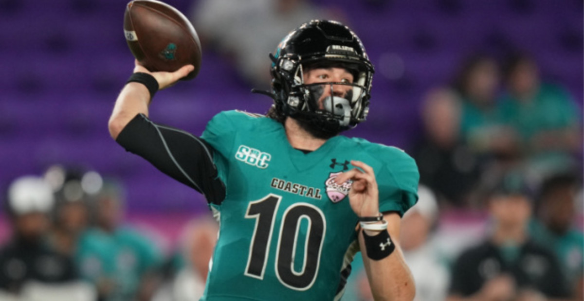 Coastal Carolina Chanticleers quarterback Grayson McCall attempts a pass during a college football game.