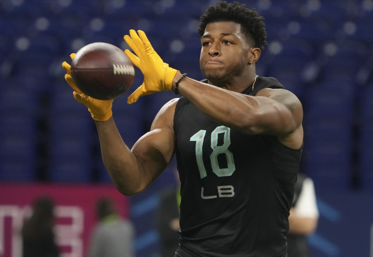 Mar 5, 2022; Indianapolis, IN, USA; Appalachian State linebacker D'Marco Jackson (LB18) goes through drills during the 2022 NFL Scouting Combine at Lucas Oil Stadium.