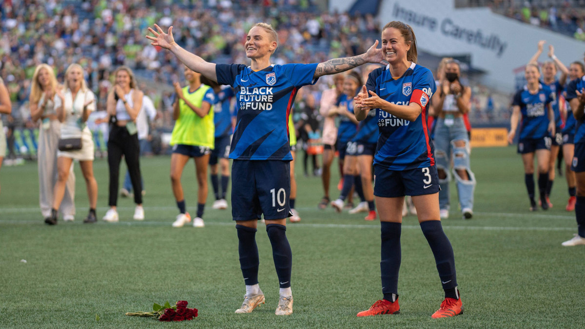 OL Reign’s Jess Fishlock and Lauren Barnes