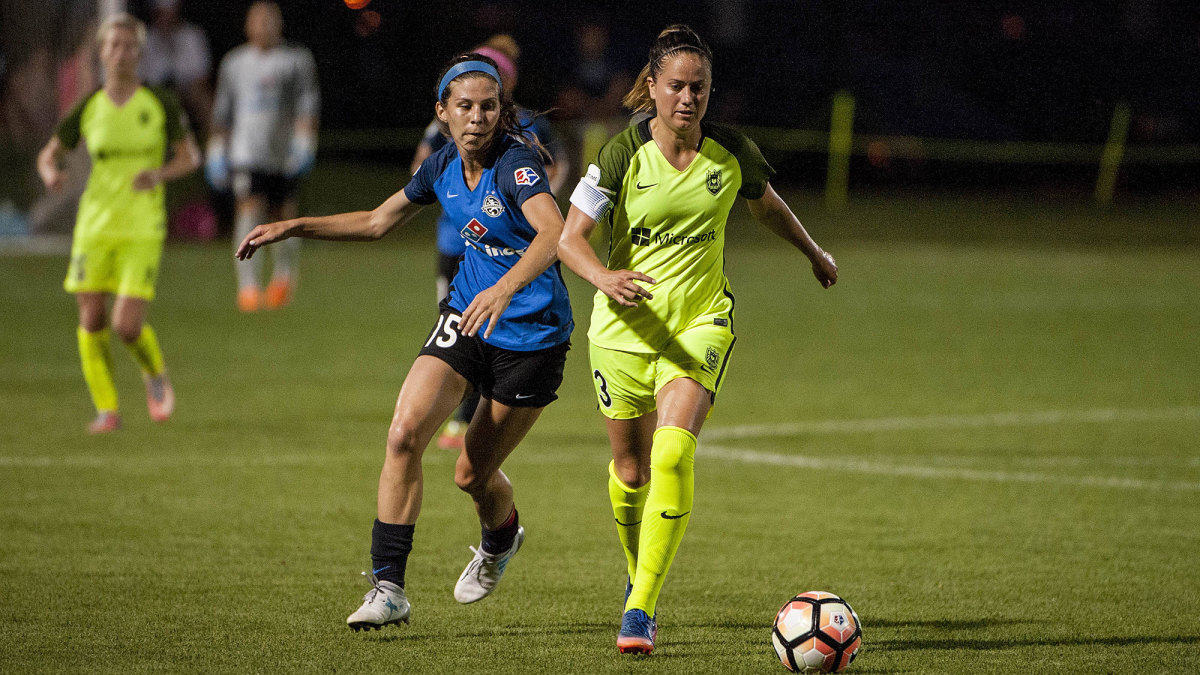 Erika Tymrak and Lauren Barnes in a 2017 NWSL match