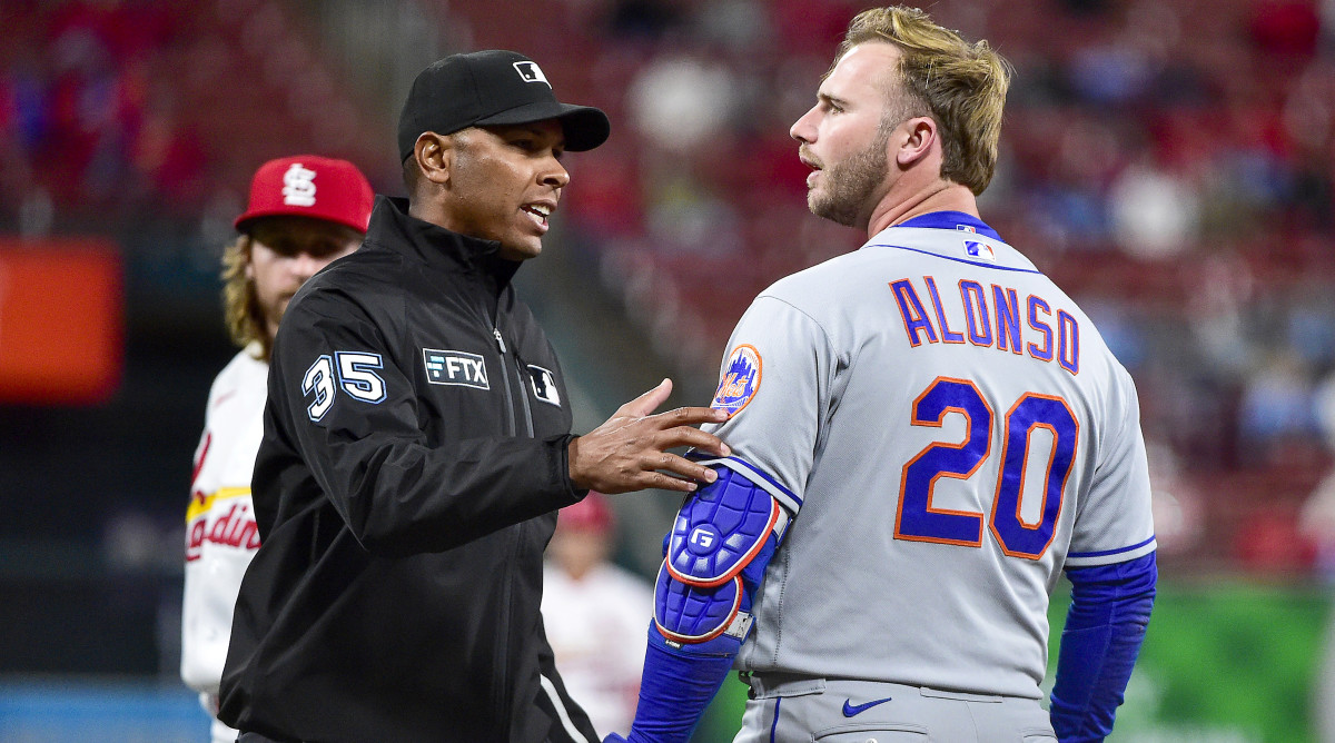 Apr 26, 2022; St. Louis, Missouri, USA;  New York Mets designated hitter Pete Alonso (20) reacts after he was hit in the head from a pitch by from St. Louis Cardinals relief pitcher Kodi Whitley (not pictured) during the eighth inning at Busch Stadium.