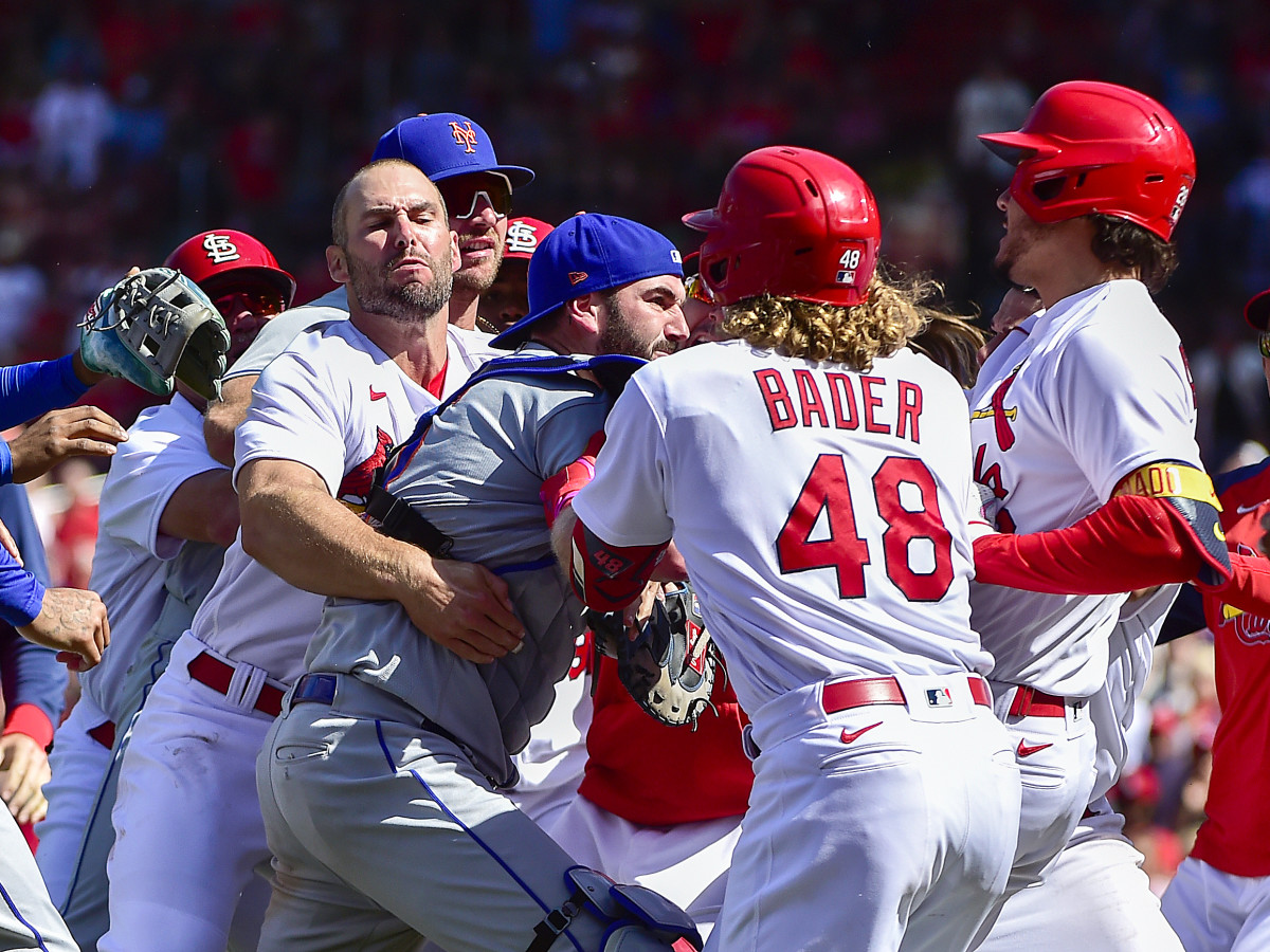 Apr 27, 2022; St. Louis, Missouri, USA;  Benches clear as St. Louis Cardinals designated hitter Nolan Arenado (28) reacts with New York Mets catcher Tomas Nido (3) and relief pitcher Yoan López (44) after a high and tight pitch during the eighth inning at Busch Stadium. Arenado was ejected from the game.