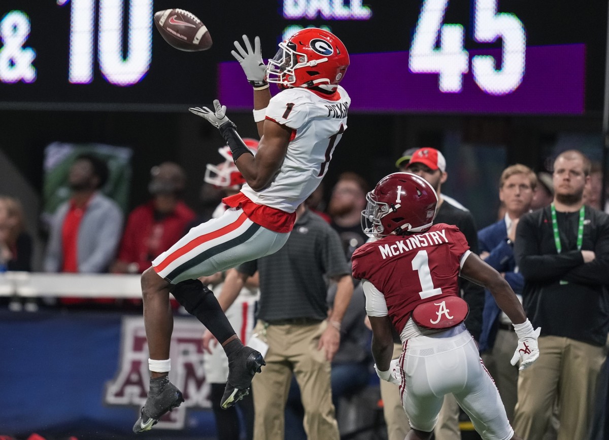 Georgia wide receiver George Pickens (1) catches a pass over Alabama defensive back Kool-Aid McKinstry (1). Mandatory Credit: Dale Zanine-USA TODAY Sports