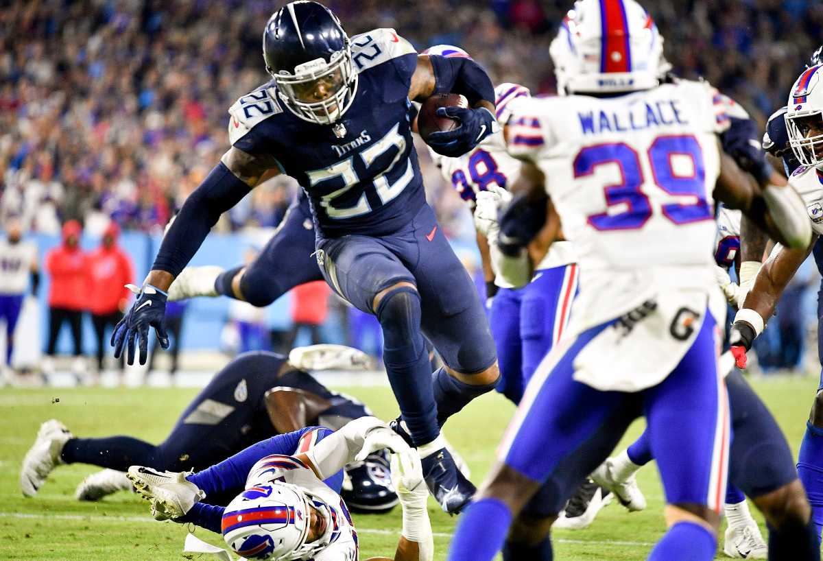 Tennessee Titans running back Derrick Henry (22) runs the ball into the end zone for a touchdown against the Bills at Nissan Stadium Monday, Oct. 18, 2021 in Nashville, Tenn.