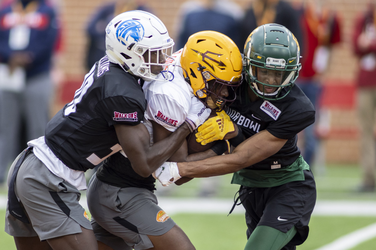 Feb 1, 2022; Mobile, AL, USA; National defensive back Joshua Williams of Fayetteville State (30) defends against National running back Rachaad White of Arizona State (3) during National practice for the 2022 Senior Bowl at Hancock Whitney Stadium. Mandatory Credit: Vasha Hunt-USA TODAY Sports