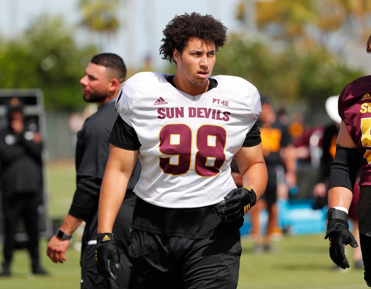 ASU defensive lineman D.J. Davidson (98) warms up during practice in Tempe August 18, 2019.