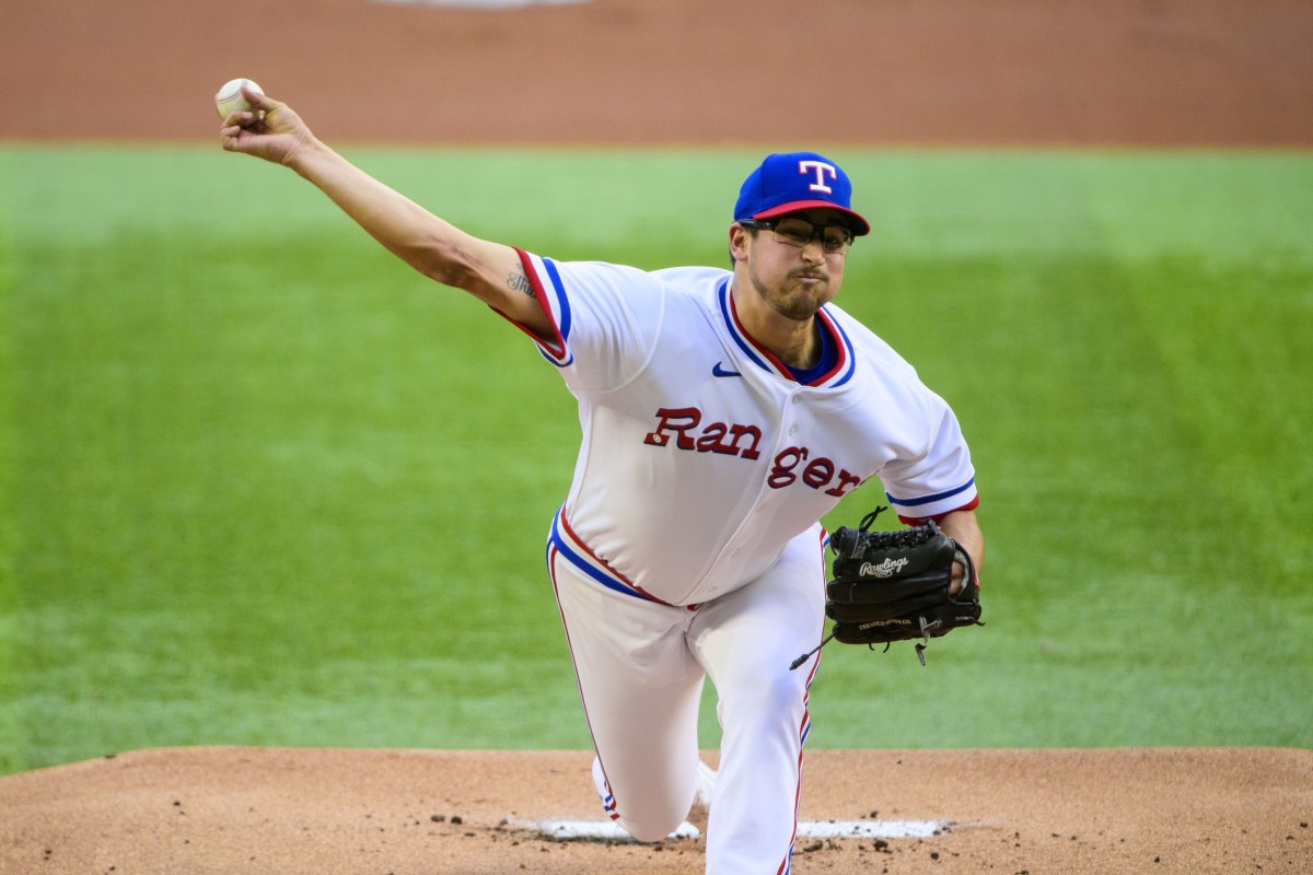 Apr 30, 2022; Arlington, Texas, USA; Texas Rangers starting pitcher Dane Dunning (33) pitches against the Atlanta Braves during the first inning at Globe Life Field. Mandatory Credit: Jerome Miron-USA TODAY Sports