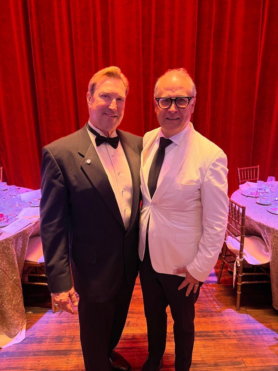 Terry Tallen stands alongside CEO and IU Foundation president J.T. Forbes with his Laurel Pin award.