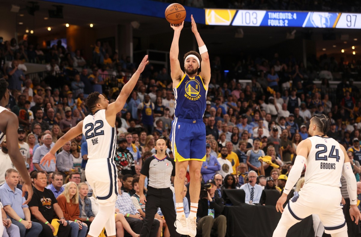 May 1, 2022; Memphis, Tennessee, USA; Golden State Warriors guard Klay Thompson (11) shoots the ball against the Memphis Grizzlies during game one of the second round for the 2022 NBA playoffs at FedExForum. Mandatory Credit: Joe Rondone-USA TODAY Sports