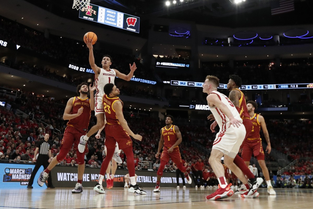 Mar 20, 2022; Milwaukee, WI, USA; Wisconsin Badgers guard Johnny Davis (1) shoots in the second round of the 2022 NCAA Tournament at Fiserv Forum. Credit: Jeff Hanisch-USA TODAY Sports