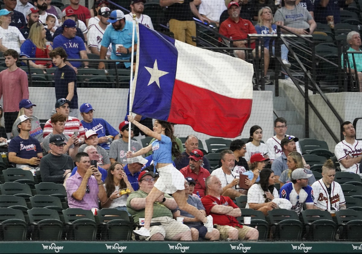 May 1, 2022; Arlington, Texas, USA; A Rangers Six Shooter runs on top of the dugout prior to a game between the Texas Rangers and the Atlanta Braves at Globe Life Field. Mandatory Credit: Raymond Carlin III-USA TODAY Sports