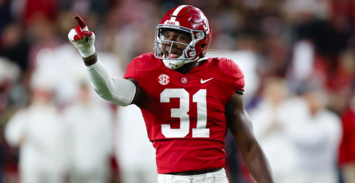 Alabama Crimson Tide defensive star Will Anderson points at his opponents during a college football game in the SEC.