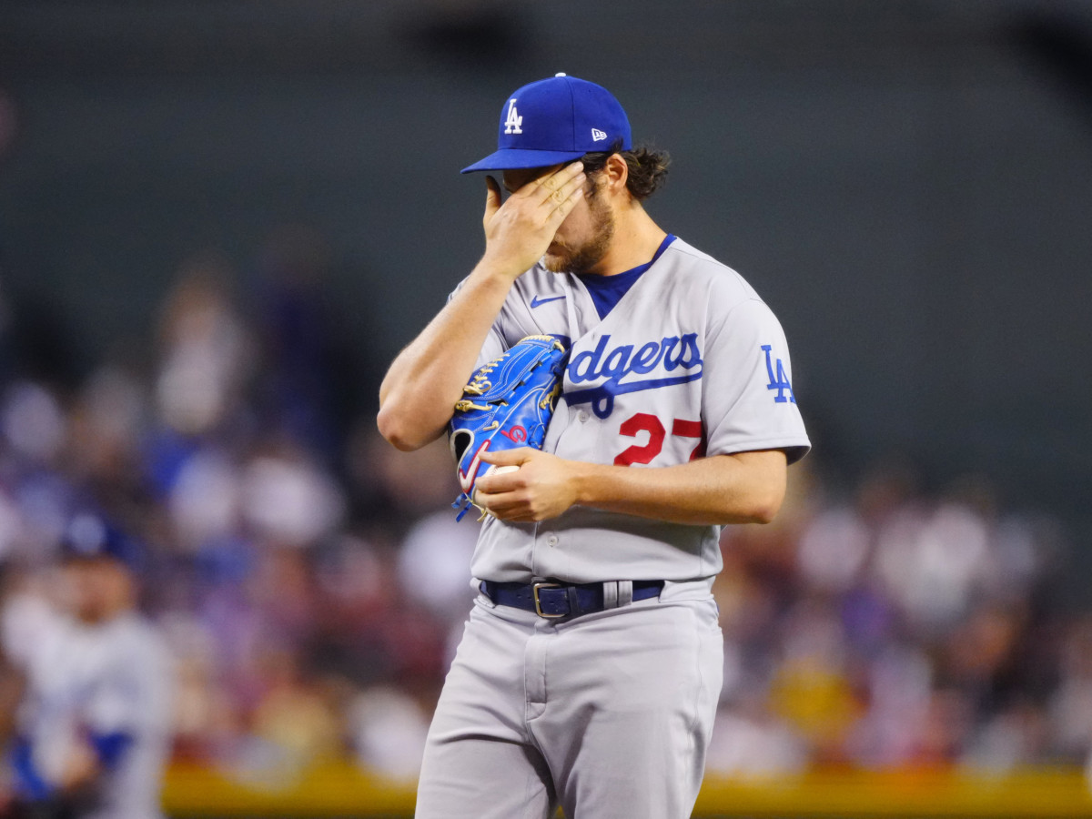 Jun 18, 2021; Phoenix, Arizona, USA; Los Angeles Dodgers pitcher Trevor Bauer reacts against the Arizona Diamondbacks at Chase Field.