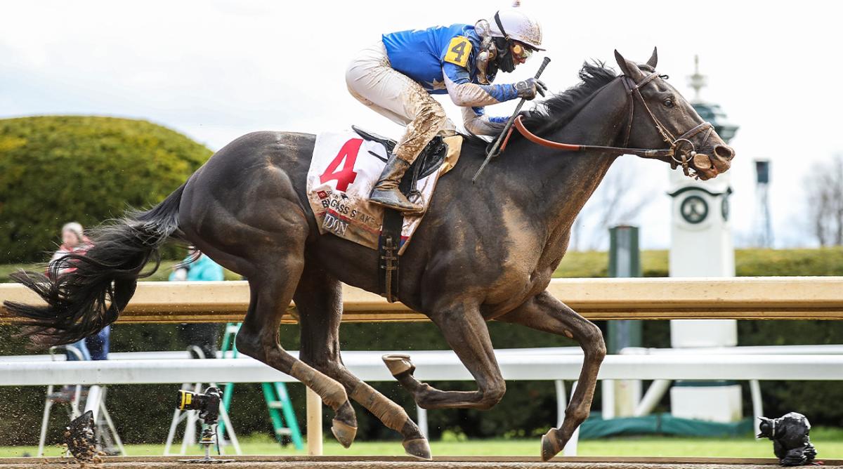 Zandon, with Flavien Prat up, wins the Blue Grass Stakes on Saturday, April 9, 2022, at Keeneland race course.