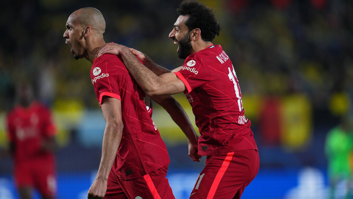 Fabinho and Mohamed Salah celebrate Liverpool’s win over Villarreal