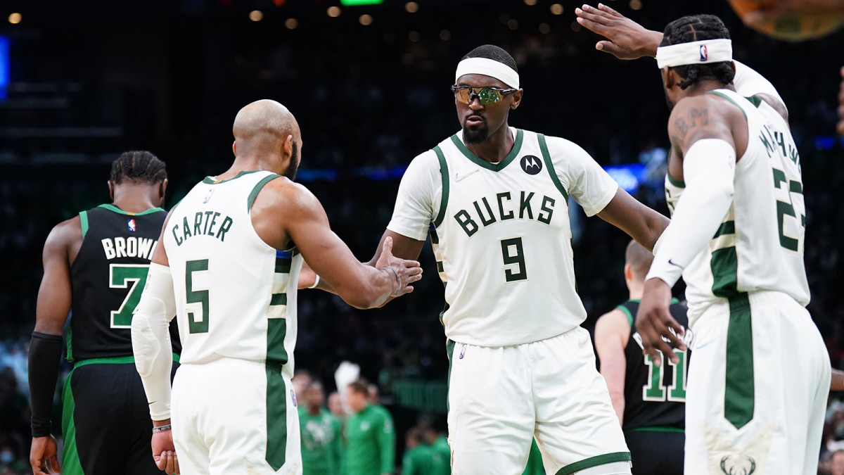 Milwaukee Bucks center Bobby Portis (9) reacts with his teammates after his three point basket against the Boston Celtics.