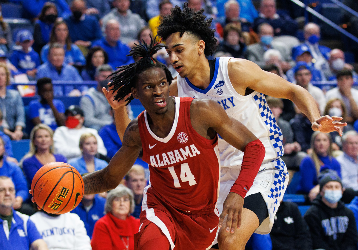 Alabama Crimson Tide guard Keon Ellis (14) drives to the basket during the first half against the Kentucky Wildcats at Rupp Arena at Central Bank Center.