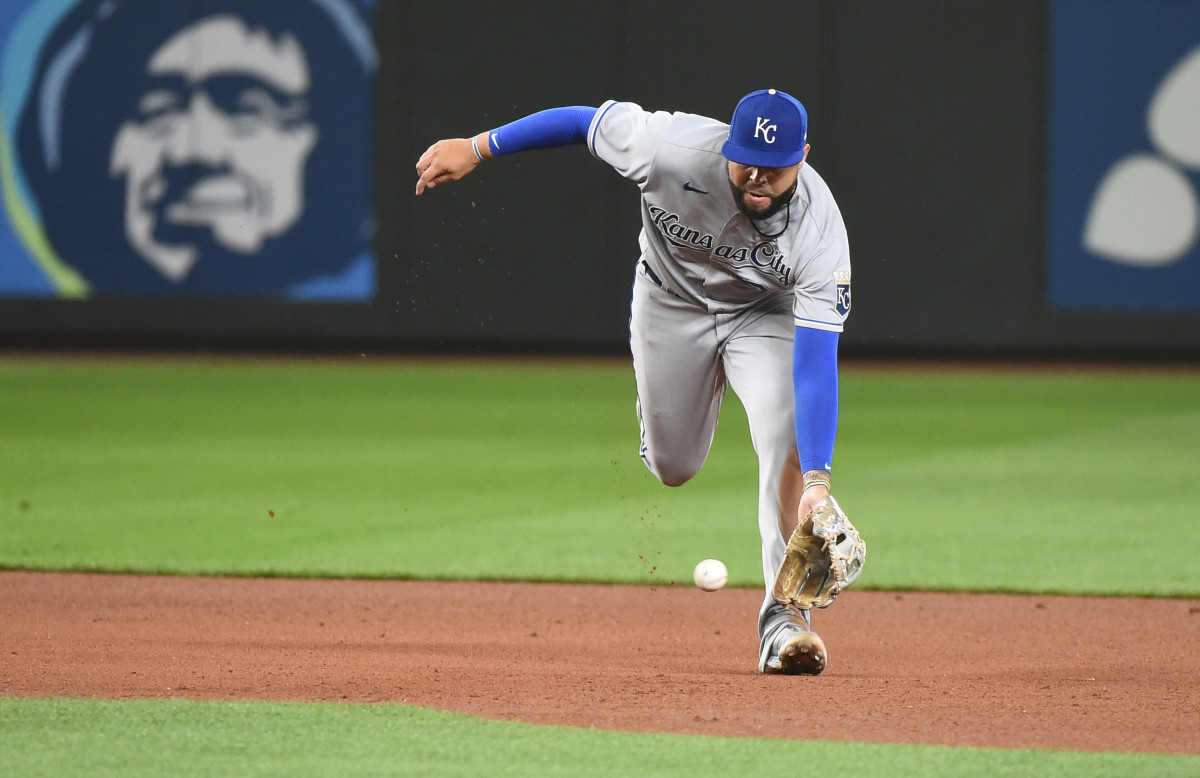 Aug 26, 2021; Seattle, Washington, USA; Kansas City Royals third baseman Emmanuel Rivera (26) charges the ball against the Seattle Mariners during the bottom of the ninth inning at T-Mobile Park. Mandatory Credit: James Snook-USA TODAY Sports