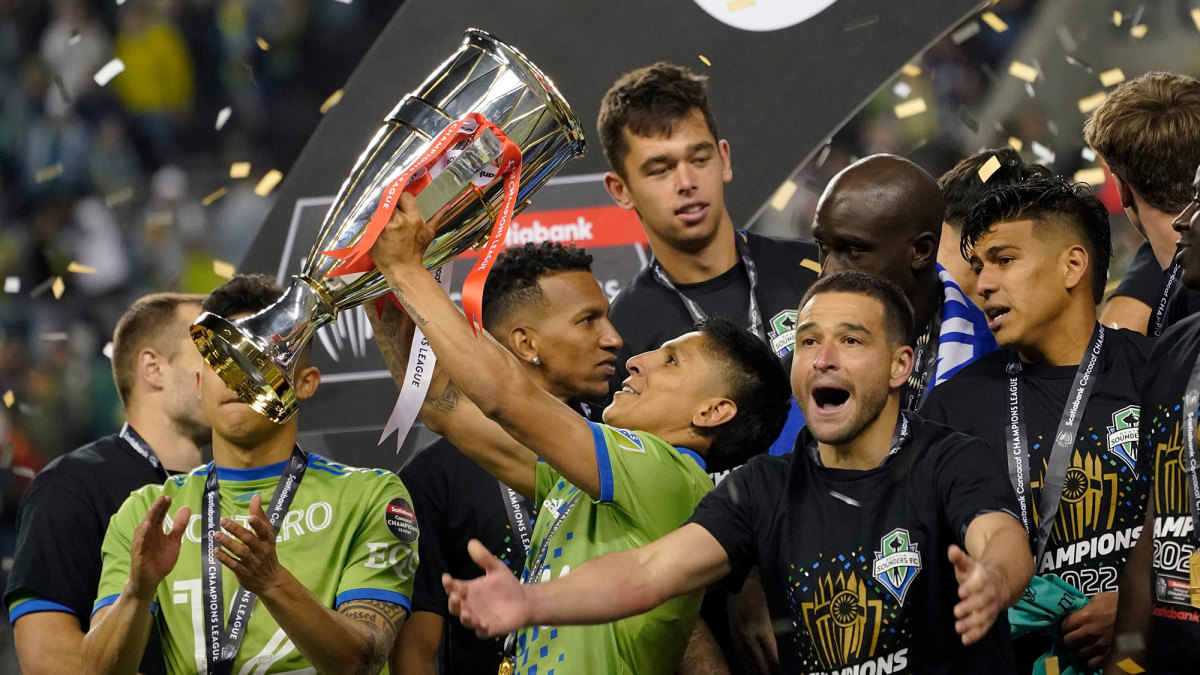 Raul Ruidiaz lifts the Concacaf Champions League trophy