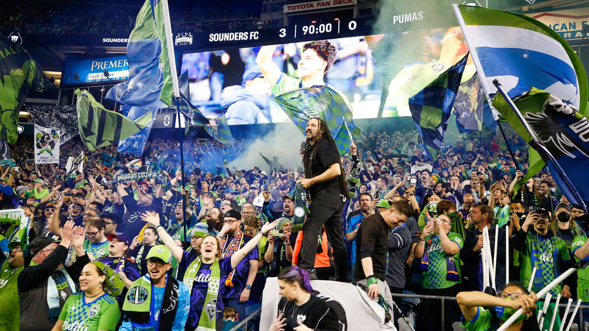 Seattle Sounders fans celebrate the CCL title