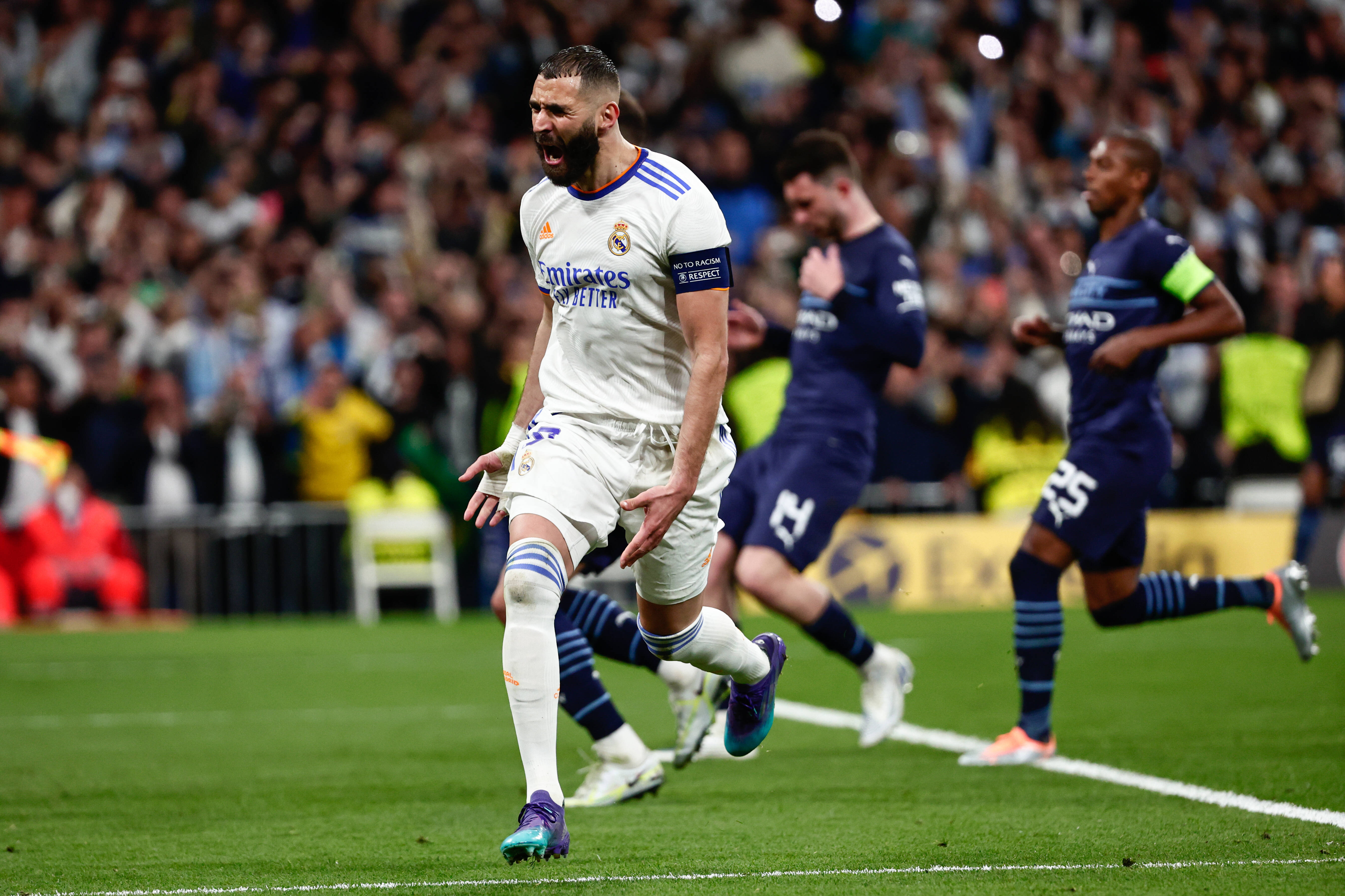 Karim Benzema pictured celebrating after scoring the winning goal in Real Madrid's 6-5 aggregate victory over Man City in their Champions League semi-final in 2022