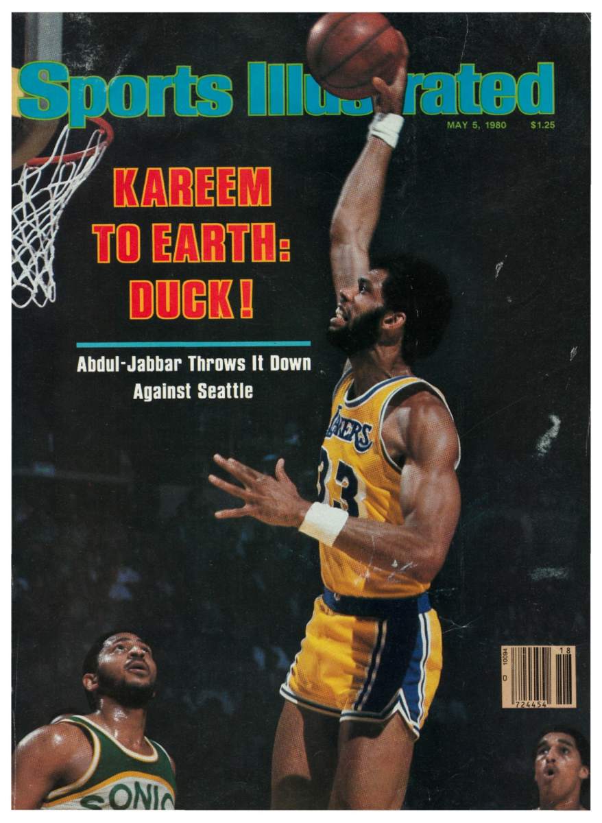 Kareem Abdul-Jabbar dunks on the cover of SI in 1980