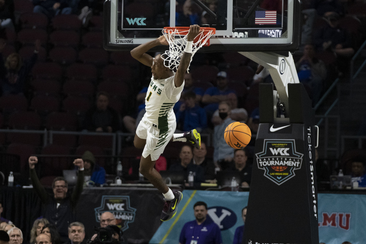 March 5, 2022; Las Vegas, NV, USA; San Francisco Dons guard Jamaree Bouyea (1) dunks the basketball against the Brigham Young Cougars during the second half in the quarterfinals of the WCC Basketball Championships at Orleans Arena.