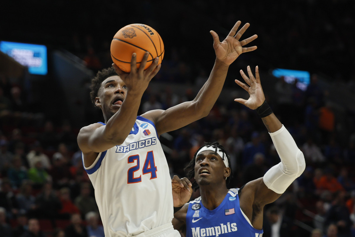 Boise State Broncos forward Abu Kigab (24) shoots against Memphis Tigers center Jalen Duren (2) in the first half during the first round of the 2022 NCAA Tournament at Moda Center.