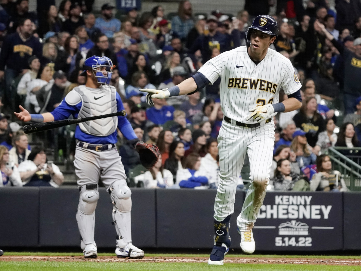 Milwaukee Brewers’ Christian Yelich hits a two-run home run during the fifth inning of a baseball game against the Chicago Cubs Friday, April 29, 2022, in Milwaukee.