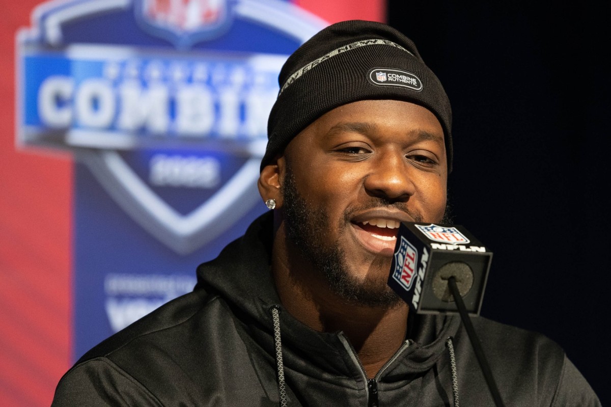 Mar 4, 2022; Indianapolis, IN, USA; Michigan defensive lineman Chris Hinton (DL12) talks to the media during the 2022 NFL Combine.
