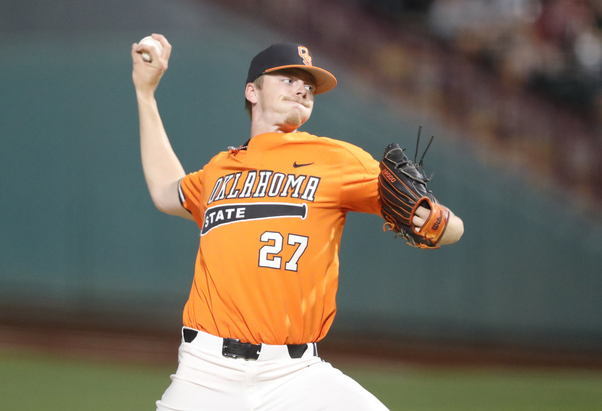 May 26, 2021; Oklahoma City, Oklahoma, USA; Oklahoma St. pitcher Justin Campbell (27) delivers a pitch to Oklahoma during the Big 12 Conference Baseball Tournament at Chickasaw Bricktown Ballpark. Mandatory Credit: Alonzo Adams-USA TODAY Sports