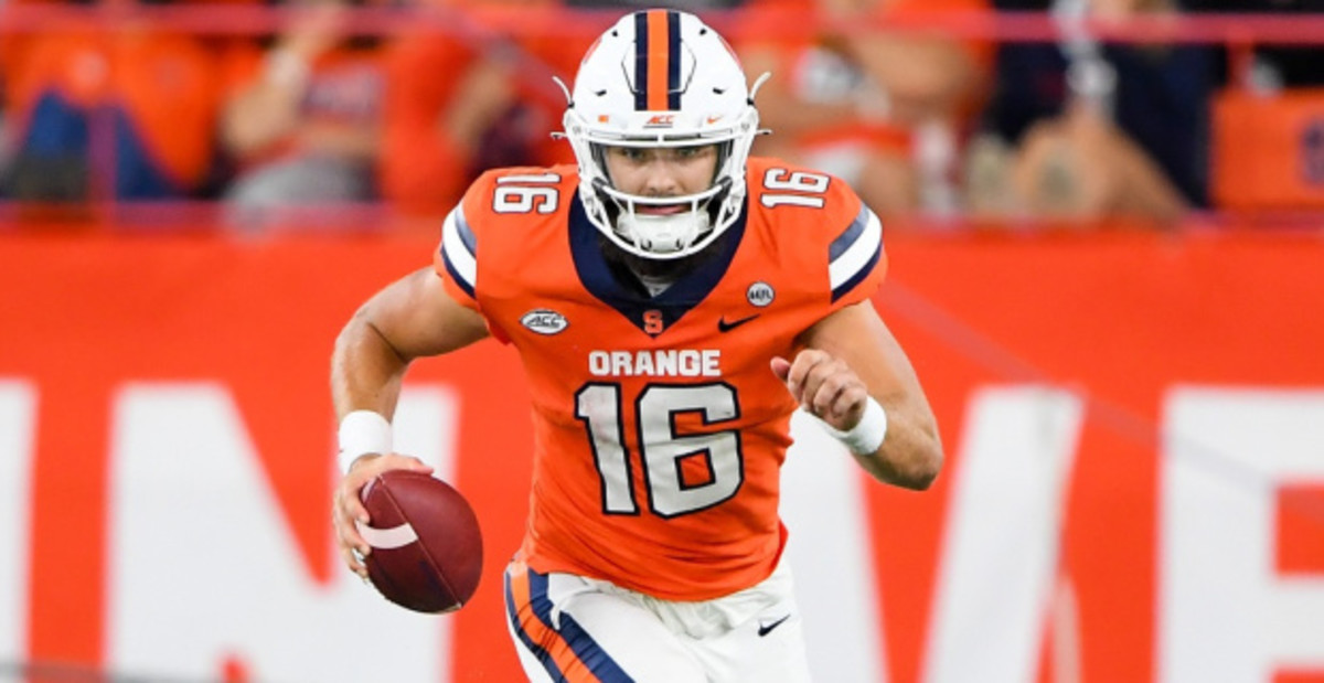 Syracuse Orange quarterback Garrett Shrader on a rushing attempt during a college football game in the ACC.