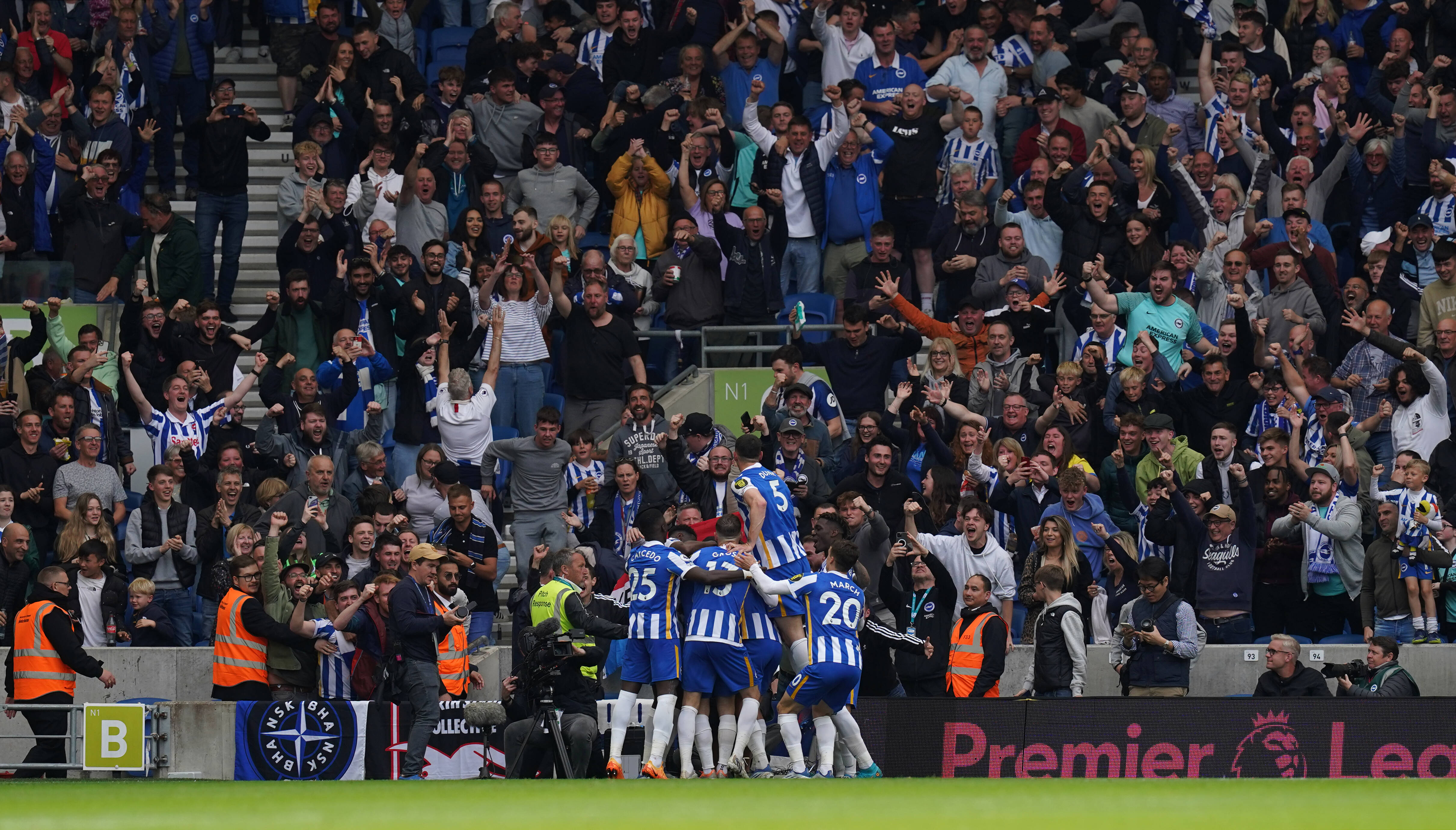 Brighton players pictured celebrating during their thrashing of Manchester United in May 2022