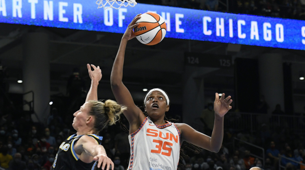 Connecticut Sun's Jonquel Jones (35) goes up for a shot against Chicago Sky's Courtney Vandersloot (22) during the second half of Game 4 of a WNBA basketball playoff semifinal, Wednesday, Oct. 6, 2021, in Chicago.