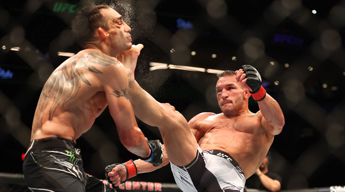 Michael Chandler kicks Tony Ferguson for the knockout during UFC 274 at Footprint Center