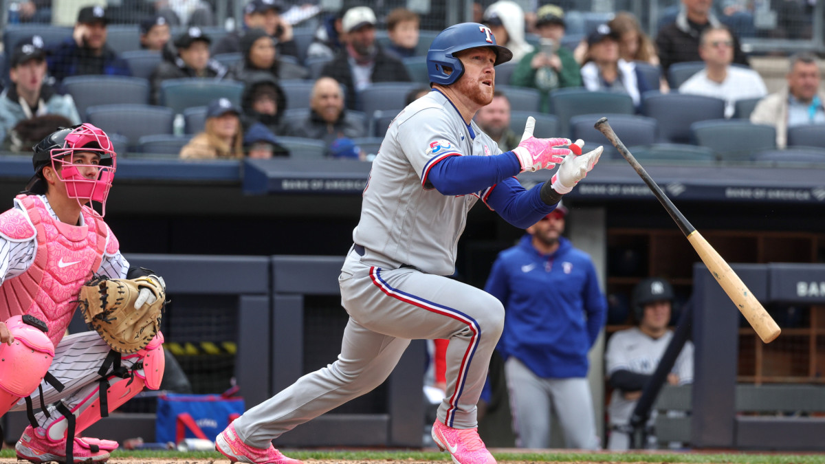 May 8, 2022; Bronx, New York, USA; Texas Rangers right fielder Kole Calhoun (56) looks up at his solo home run during the seventh inning against the New York Yankees at Yankee Stadium.