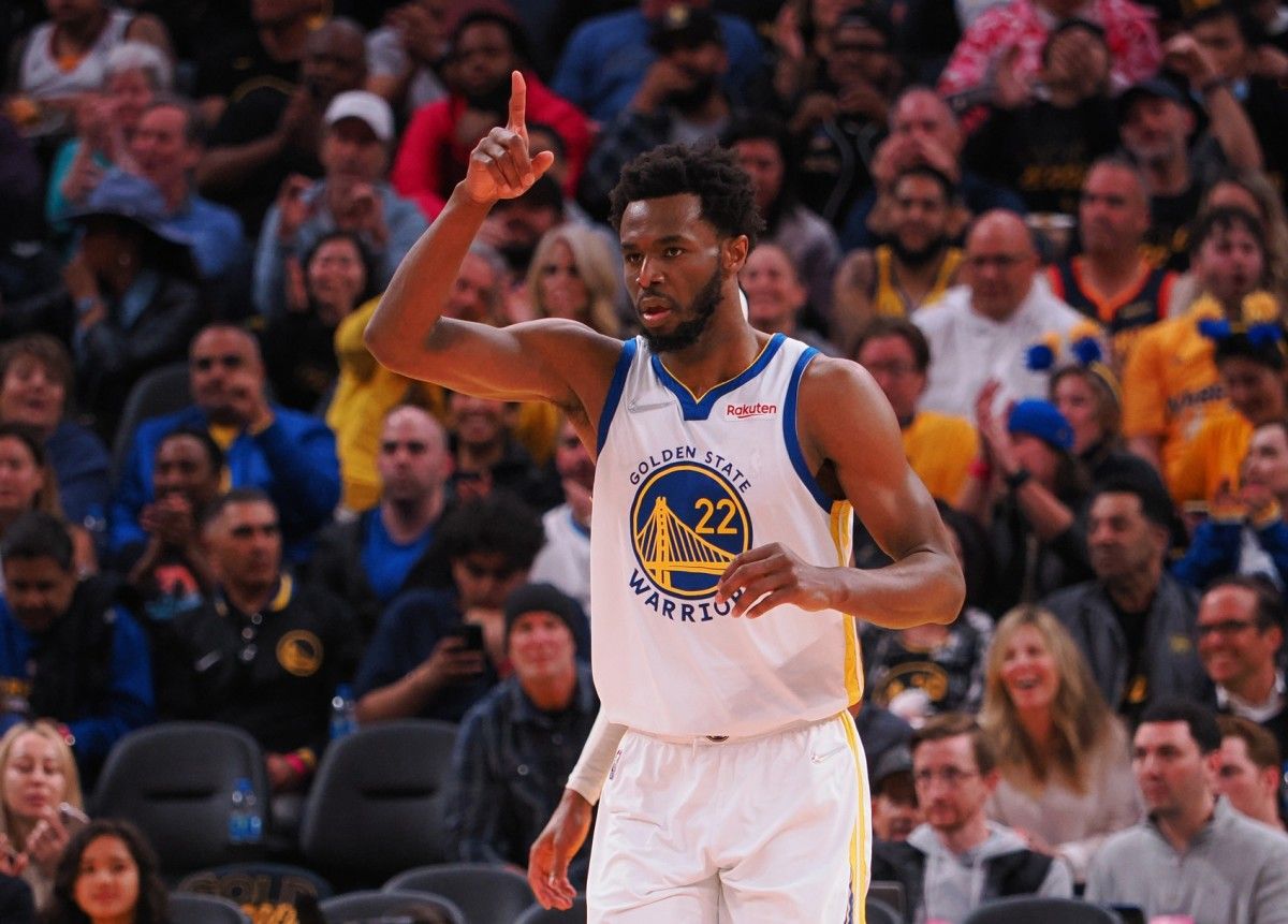 Golden State Warriors forward Andrew Wiggins (22) gestures after a basket against the Denver Nuggets during the third quarter of game two of the first round for the 2022 NBA playoffs at Chase Center.