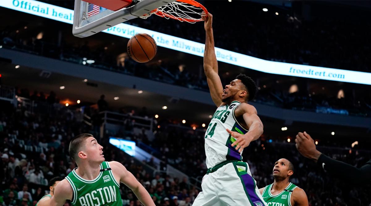Milwaukee Bucks’ Giannis Antetokounmpo dunks past Boston Celtics’ Payton Pritchard during the first half of Game 3 of an NBA basketball Eastern Conference semifinals playoff series Saturday, May 7, 2022, in Milwaukee.