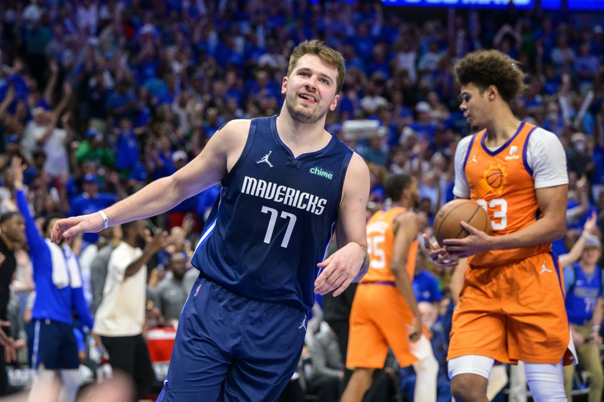 May 8, 2022; Dallas, Texas, USA; Dallas Mavericks guard Luka Doncic (77) celebrates making a basket against the Phoenix Suns during the fourth quarter during game four of the second round for the 2022 NBA playoffs at American Airlines Center. Mandatory Credit: Jerome Miron-USA TODAY Sports