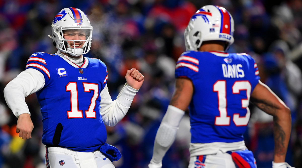 Bills quarterback Josh Allen (17) celebrates a touchdown pass with wide receiver Gabriel Davis (13).