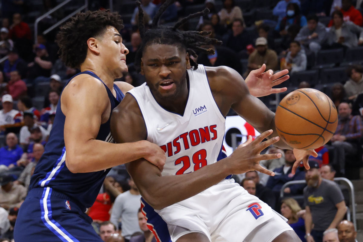 Detroit Pistons center Isaiah Stewart (28) is fouled by Dallas Mavericks guard Josh Green (8) in the second half at Little Caesars Arena.