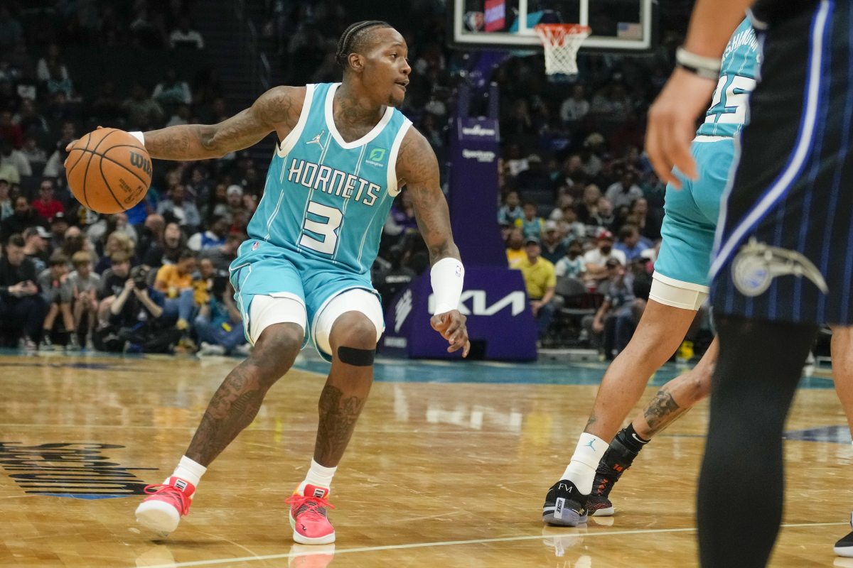Charlotte Hornets guard Terry Rozier (3) handles the ball against the Orlando Magic during the second quarter at Spectrum Center.