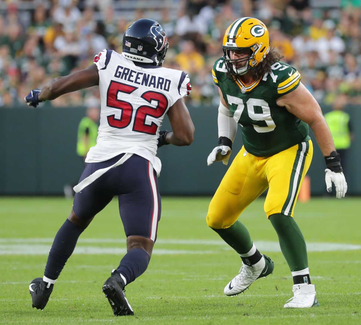 Green Bay Packers tackle Dennis Kelly (79) provides pass protection from Houston Texans defensive end Jonathan Greenard (52) during their preseason game Saturday, August 14, 2021 at Lambeau Field in Green Bay, Wis. The Houston Texans beat the Green Bay Packers 26-7. Mjs Kelly 22 Jpg Packers15