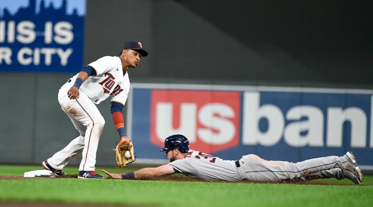 Houston Astros’ Kyle Tucker, right, steals second base before Minnesota Twins second baseman Jorge Polanco can make the tag during the second inning of a baseball game, Tuesday, May 10, 2022, in Minneapolis. The Astros won 5-0.