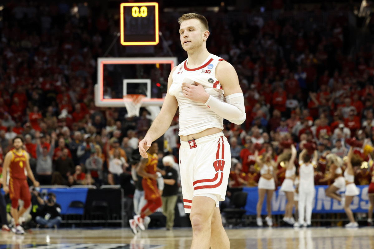 Wisconsin Badgers guard Brad Davison (34) reacts to the loss against the Iowa State Cyclones 54-49 in the second round of the 2022 NCAA Tournament at Fiserv Forum.