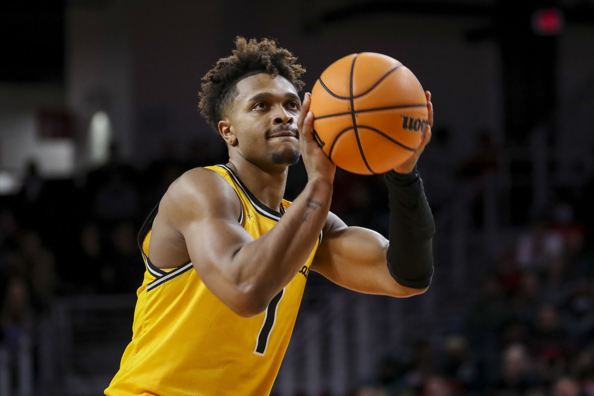 Wichita State Shockers guard Tyson Etienne (1) shoots a free throw against the Cincinnati Bearcats in the second half at Fifth Third Arena.