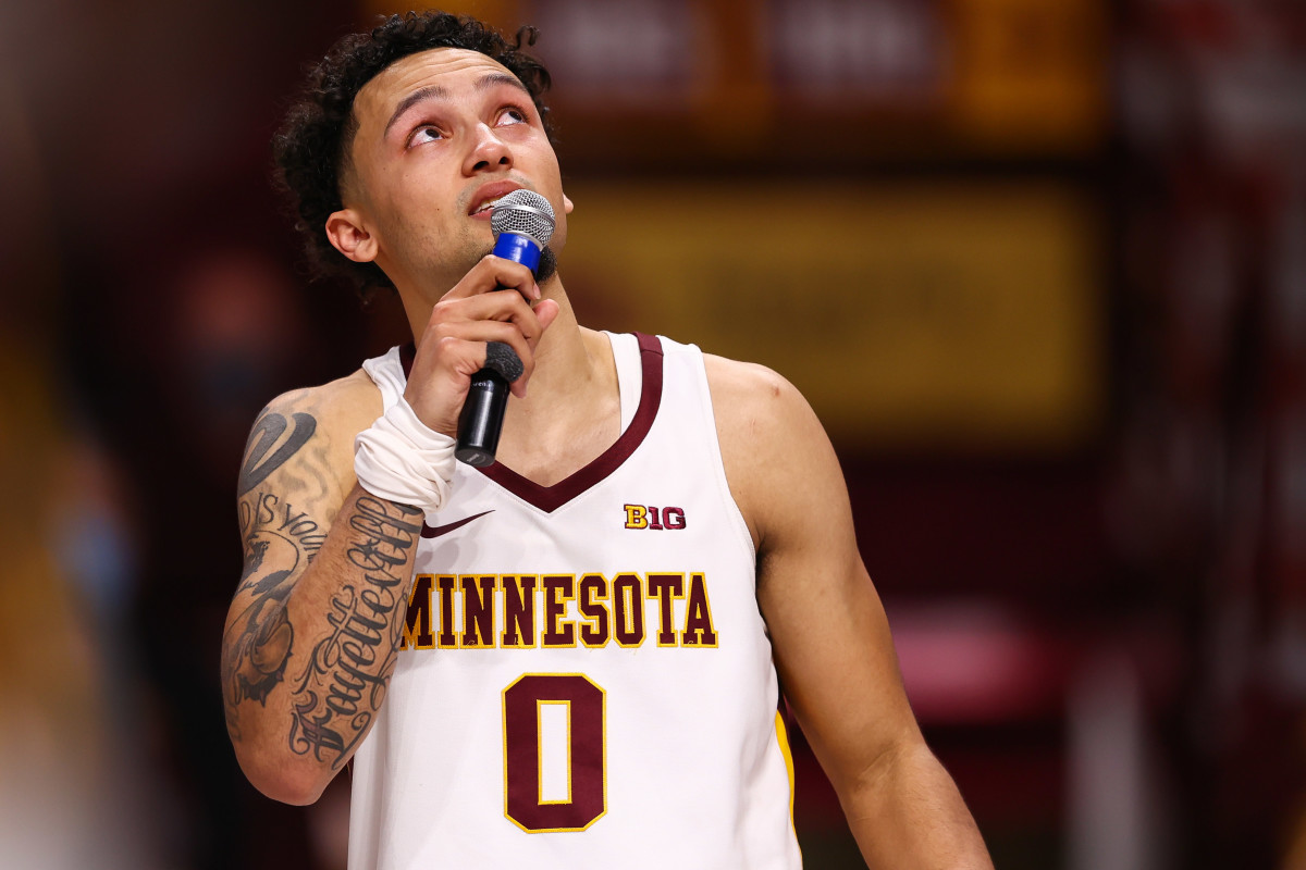 ; Minnesota Gophers guard Payton Willis (0) addresses the crowd during a senior night presentation following the game against the Indiana Hoosiers at Williams Arena.